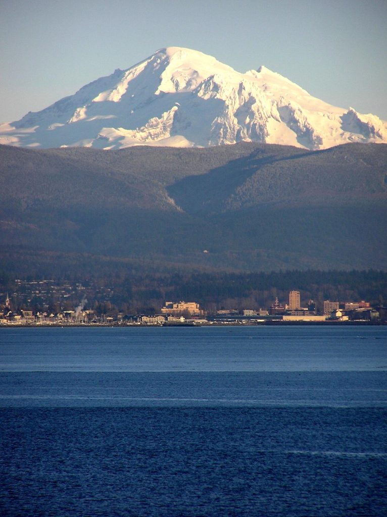 Aerial view of Bellingham, WA with Mount Baker in the background — Sparrows Pest Control service area